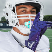Youth Tackle Football Athlete Wearing Shock Doctor Clear/Iridescent White Lux Bolt Lip Guard