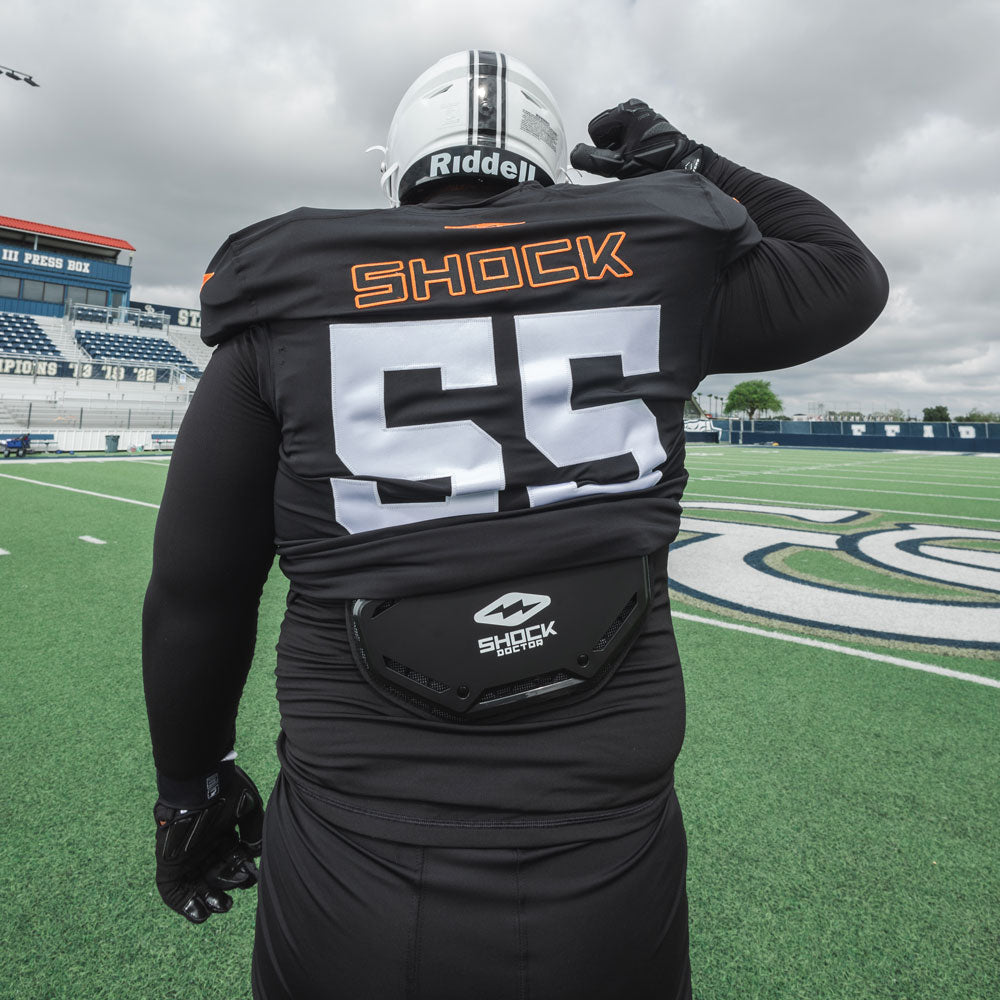 Youth Tackle Football (Lineman) Wearing Shock Doctor Showtime Black Back Plate