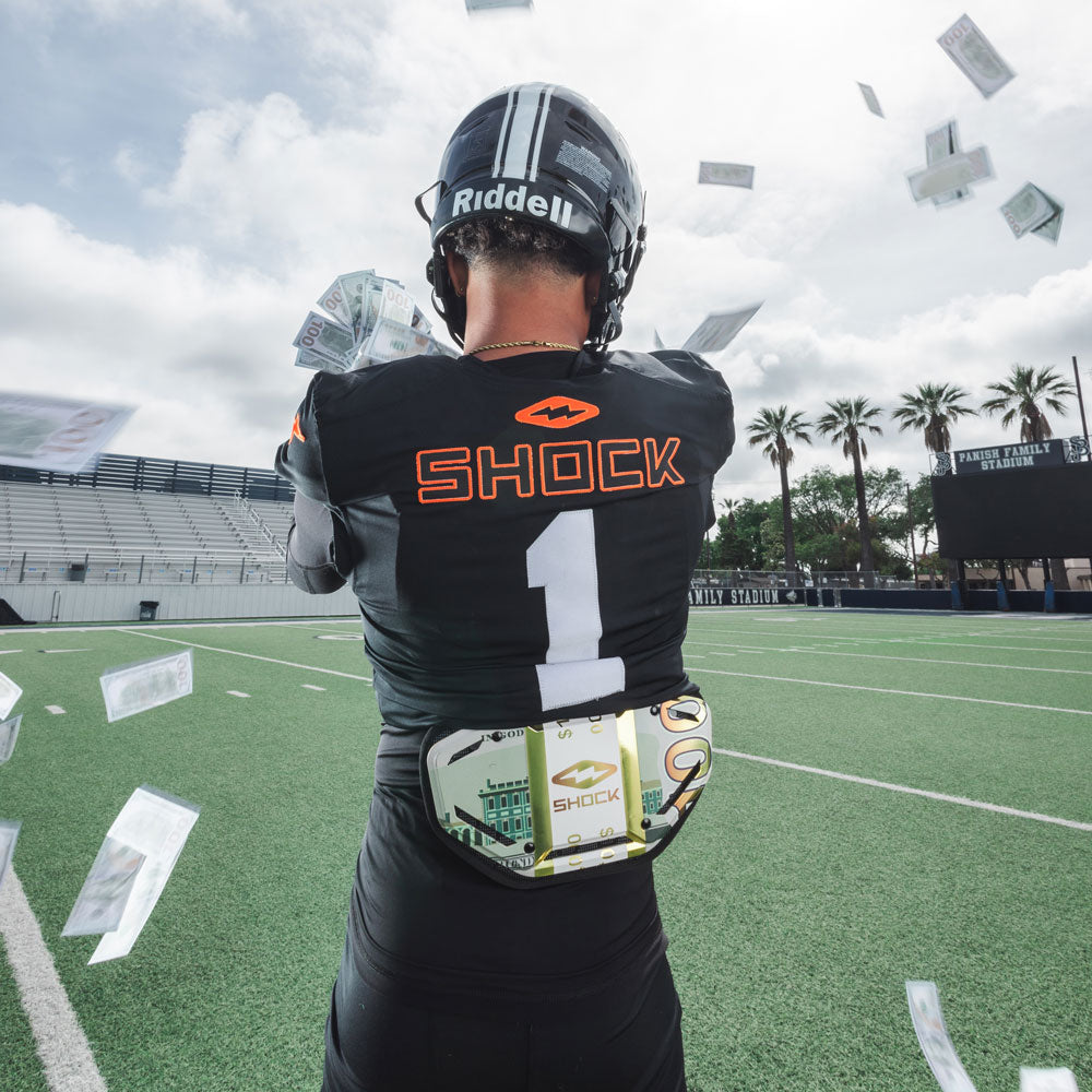 Youth Tackle Football Athlete Wearing Shock Doctor Showtime Gold Money Bands Back Plate