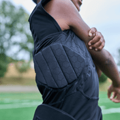Detail View of Youth Football Athlete Wearing Shock Doctor Showtime 5-Pad Black Top With Padding
