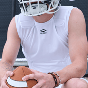 Youth Tackle Football Athlete Wearing Shock Doctor Showtime 5-Pad  White Top While Holding Football