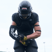 Tackle Football Athlete Wearing Shock Doctor Showtime Black Practice Jersey