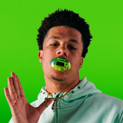 Youth Athlete Wearing Shock Doctor Jolly Rancher Max AirFlow Football Mouthguard (Green Apple Flavor)