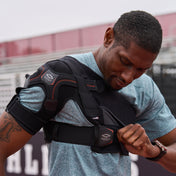 Detail Shot of Athlete Wearing Shock Doctor Ultra Shoulder Support with Stability Control  - Tightening Strap for Better Fit