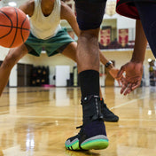 Athlete Running Basketball Drills While Wearing Shock Doctor Ultra Wrap Lace Ankle Support