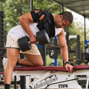 Athlete Wearing Shock Doctor Ultra Shoulder Support with Stability Control  - Lifting Dumbbells While Wearing Shoulder Support