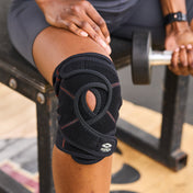 Detail View of Athlete Wearing Shock Doctor Quick-On™ Knee Support with Versatile Over Wrap System™