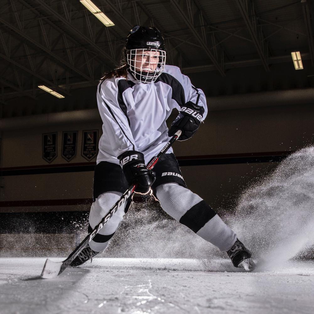 Lifestyle Shot of Female Hockey Player Wearing Shock Doctor Pelvic Protector