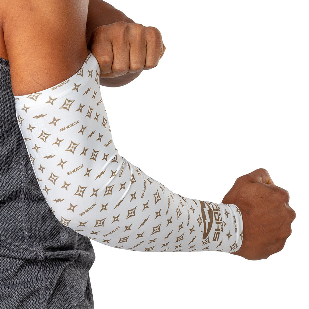 Shock Doctor White/Gold Lux Showtime Compression Arm Sleeve - On Model - Outer Arm Detail View