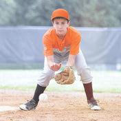 Youth Baseball Athlete Wearing Shock Doctor American Flag Core Compression Short with Bio-Flex Cup - Attempting to Catch Baseball