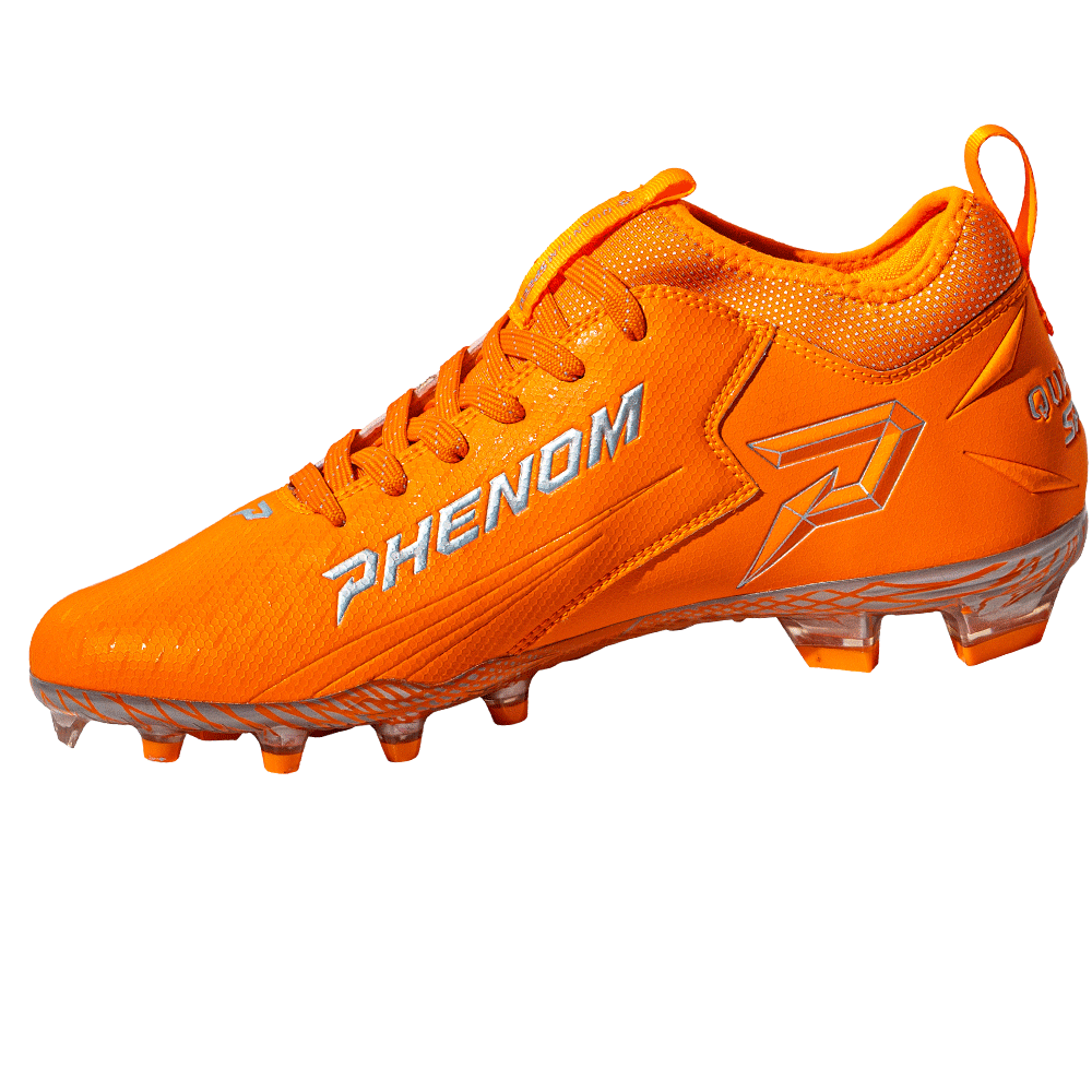Phenom Elite Quantum Speed 2.0 cleat in orange, inside view with silver PHENOM lettering, outlined P logo, and clear studs
