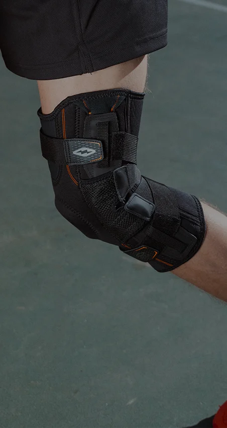 Basketball Athlete Wearing Shock Doctor 875 Ultra Hinged Knee Brace