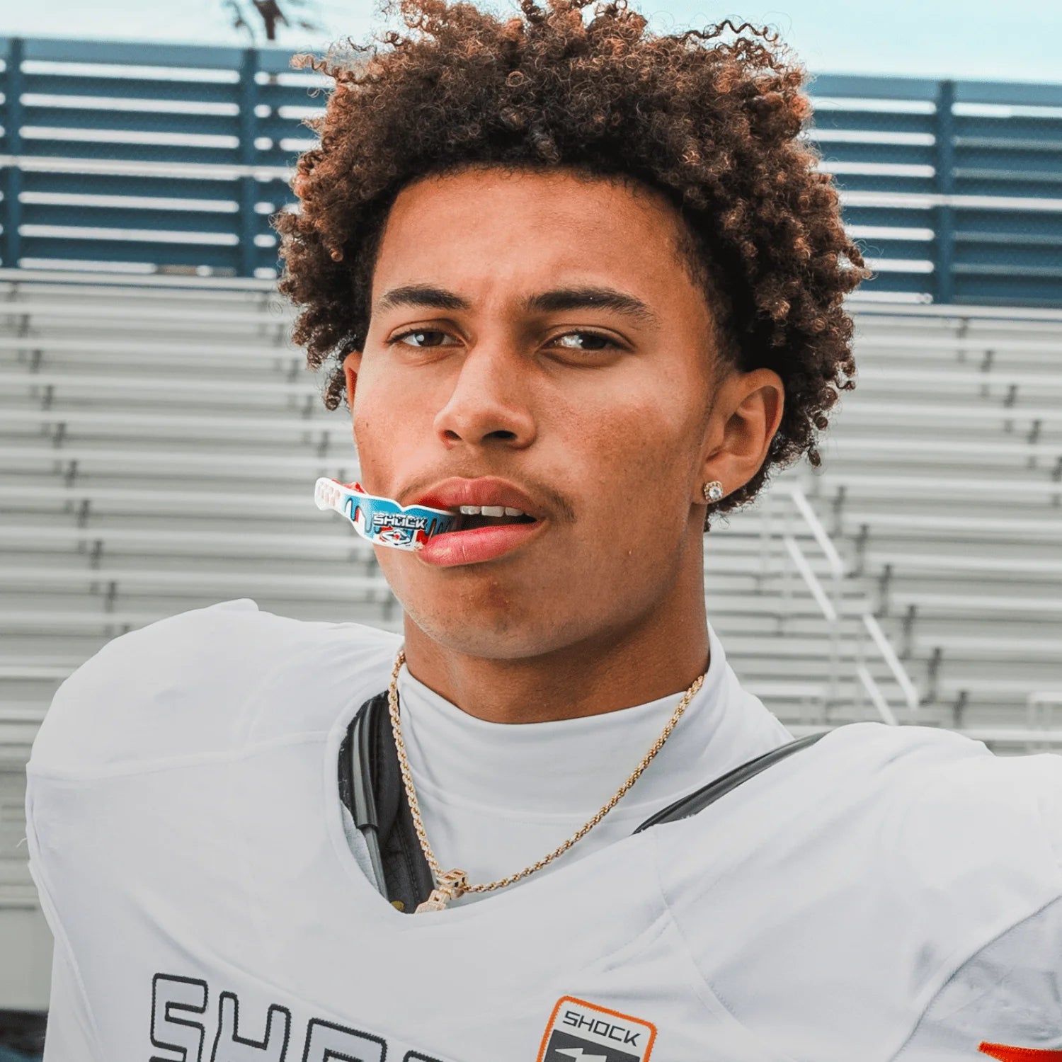 Youth Football Athlete Wearing Shock Doctor ICEE Gel Max Power Mouthguard