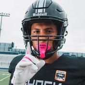 Youth Tackle Football Athlete Wearing Shock Doctor Pink Bolt Lip Guard