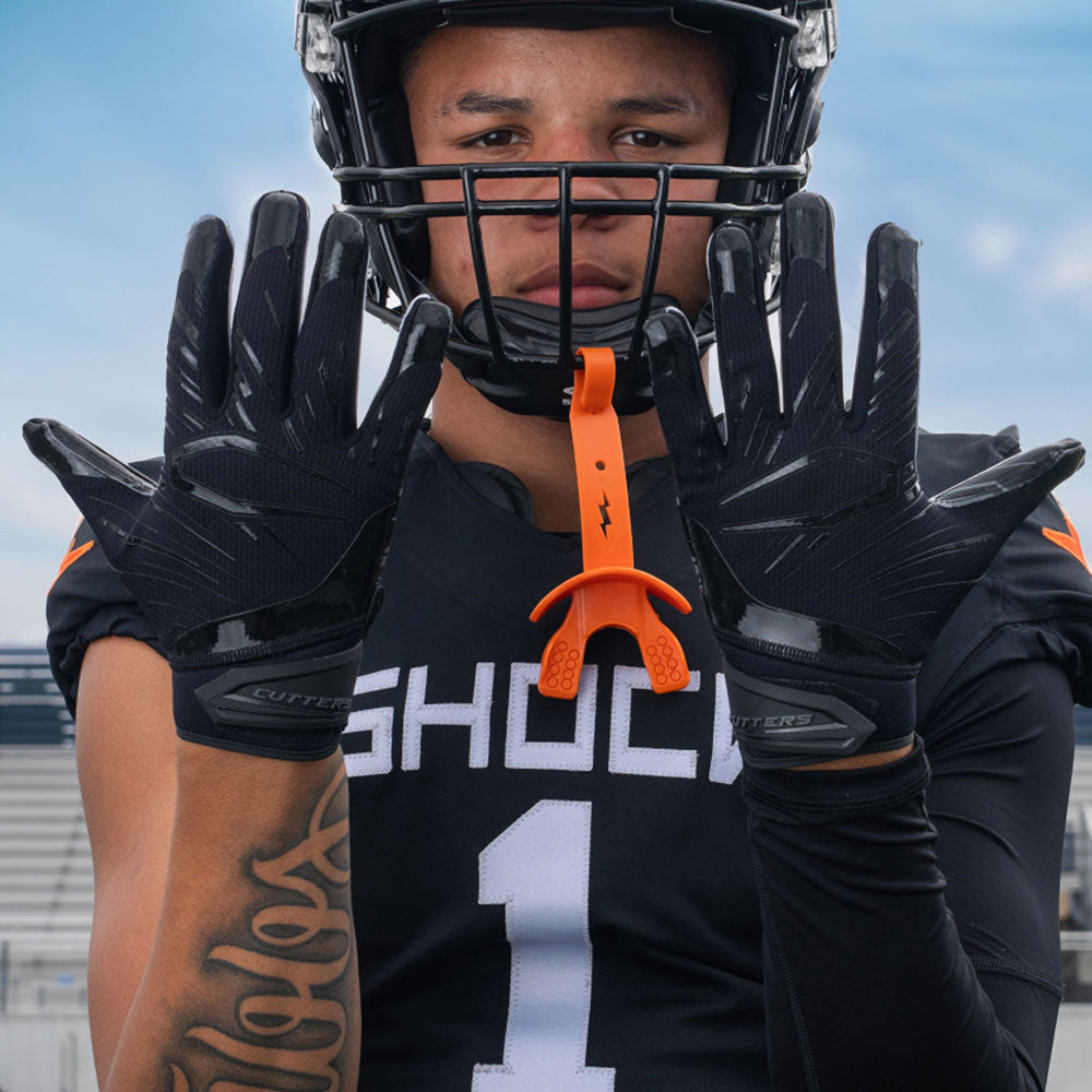 Athlete Wearing Cutters Game Day Pro Solid Black Receiver Gloves