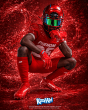 Football player crouching in a red uniform, wearing Kool-Aid Cherry Quantum Speed cleats and gloves by Phenom Elite