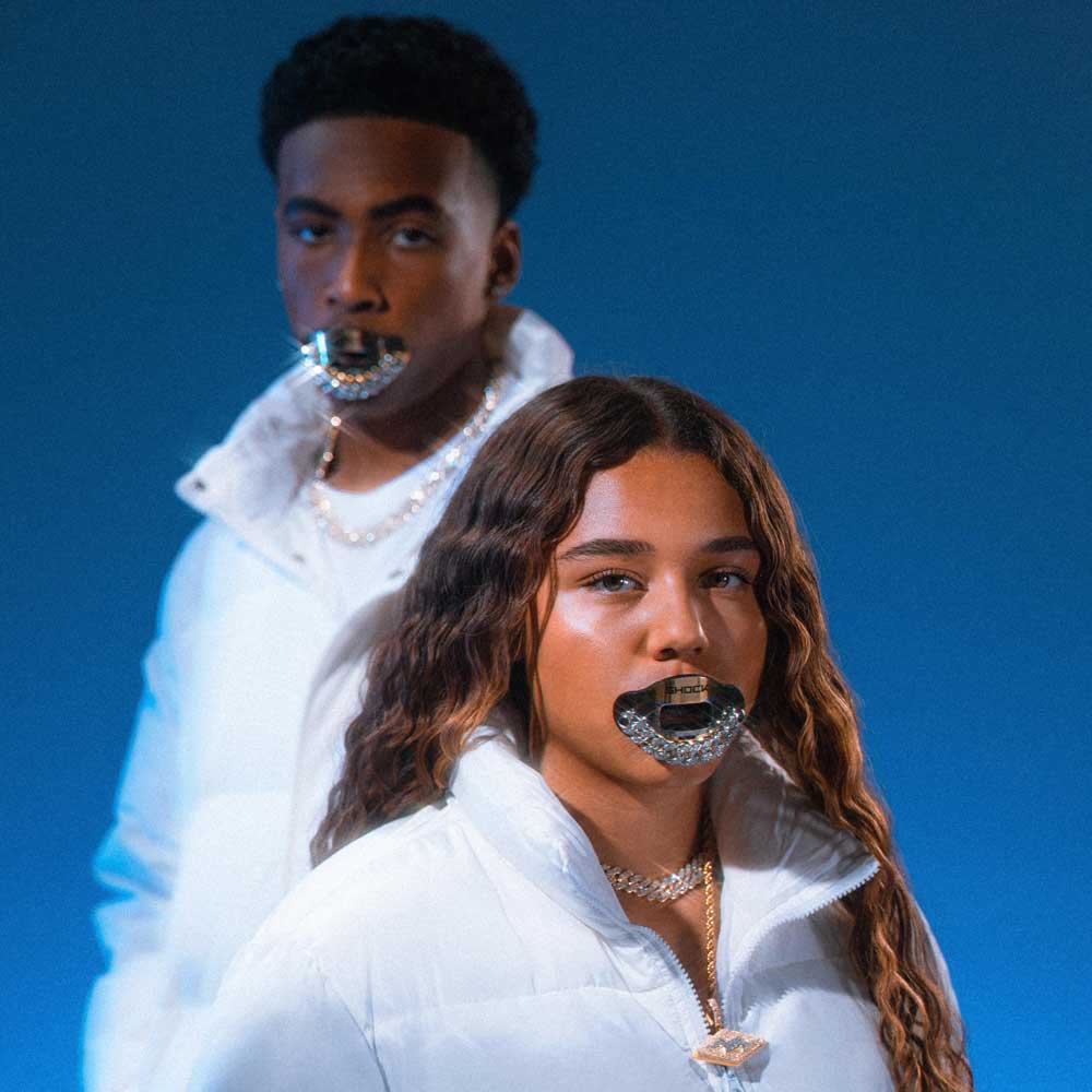 Two Youth Football Athletes Wearing Ice Chain Max AirFlow Lip Guards