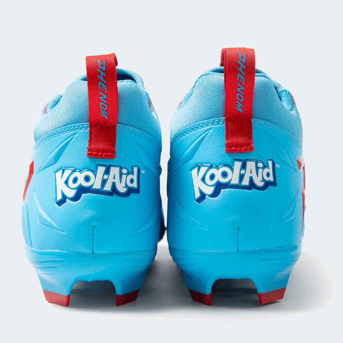 Kool-Aid Mixed Berry cleats by Phenom Elite, heel view with Kool-Aid logo and red PHENOM pull tabs