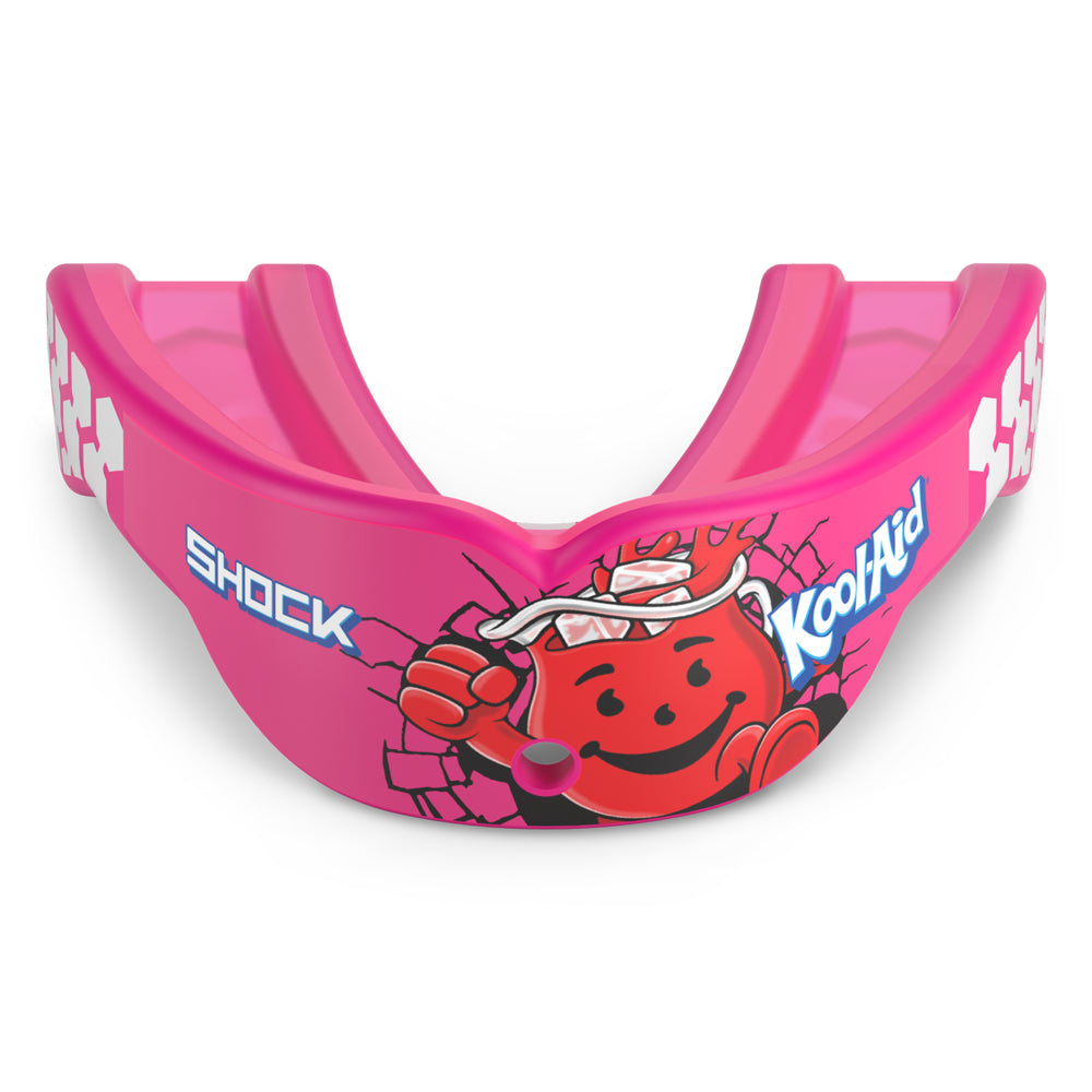 Shock Doctor Kool-Aid Gel Max Power Flavor Fusion Mouthguard in pink featuring the Kool-Aid Man bursting through a wall graphic and "Shock" logo, shown front-on with the gel-cushioned bite frame and breathing channel visible.