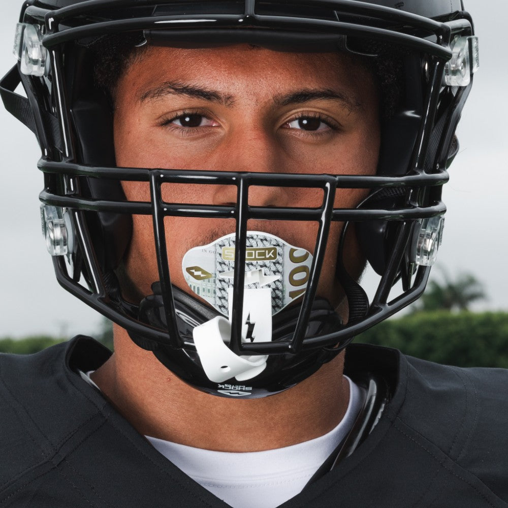 Tackle Football Athlete Wearing Shock Doctor Bolt Money Band Chain Lip Guard