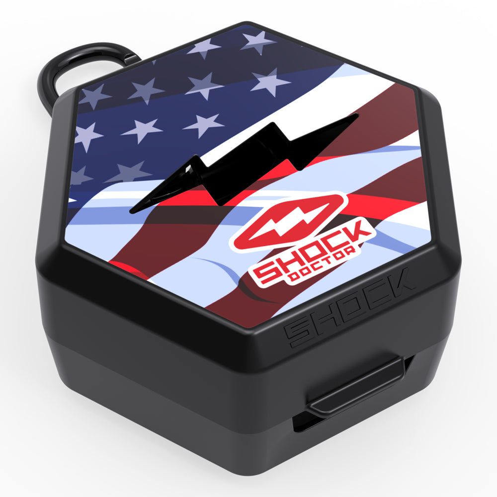 Shock Doctor Showtime Limited Edition Mouthguard Case in black and white flag print, hexagonal ventilated case with carabiner clip, angled view
