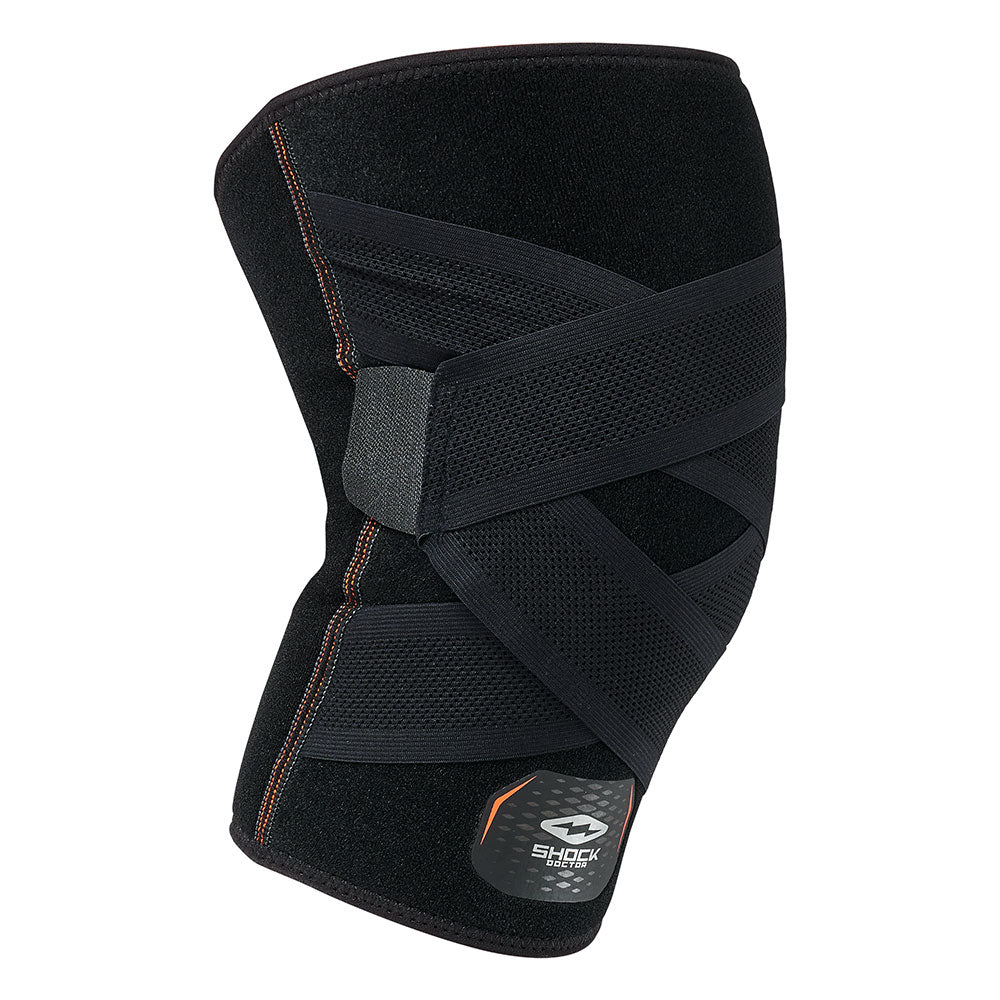 Shock Doctor Cross Compression Knee Sleeve with adjustable compression straps, side view showing X-strap design