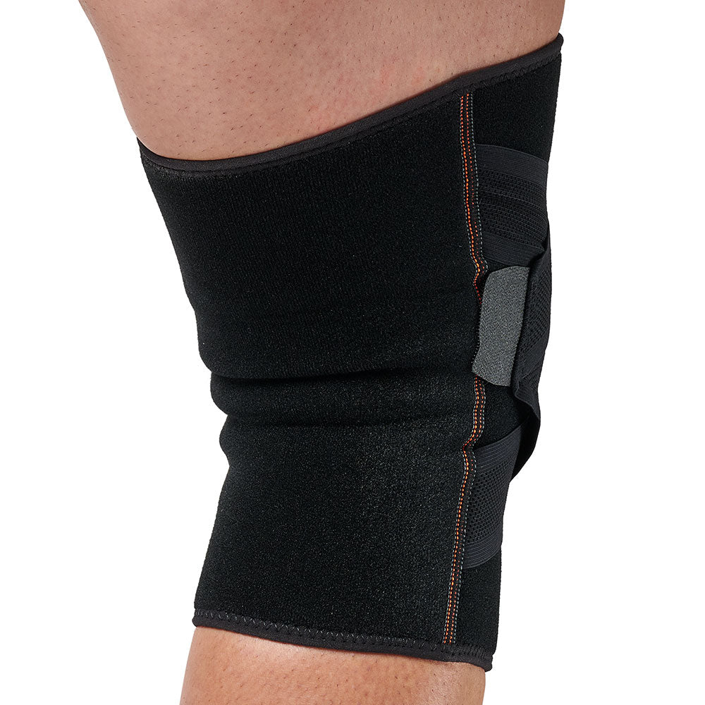 Back side view of Shock Doctor Cross Compression Knee Sleeve worn on knee, showing neoprene sleeve with crossing straps along the side