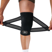 Person putting on Shock Doctor Cross Compression Knee Sleeve, holding open compression straps before wrapping around knee