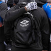 Shock Doctor Premium Backpack - Lifestyle Image 1 - Youth 7v7 Football Player Wearing Backpack