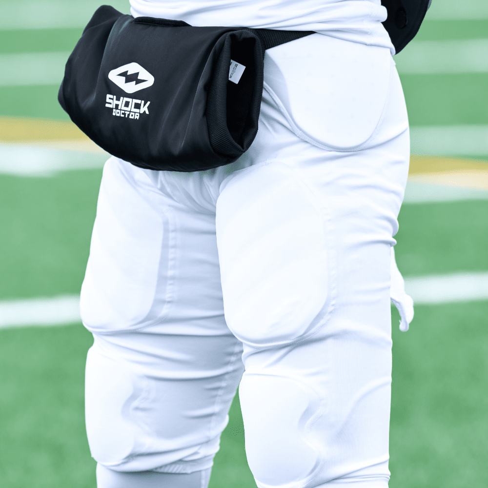Detail View of Tackle Football Athlete Wearing Shock Doctor Showtime 5-Pad White Girdle During Practice