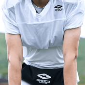 Detail View of Tackle Football Athlete Wearing Shock Doctor Showtime White Practice Jersey 