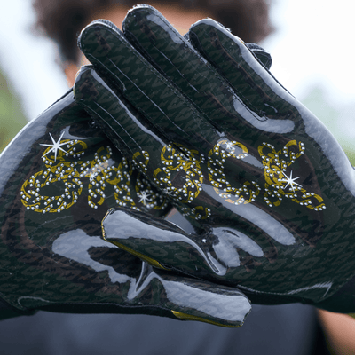Shock Doctor Black/Gold Chain Showtime Football Receiver Gloves - Lifestyle Detail View of Palm Design