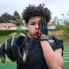 Shock Doctor Black/Gold Chain Showtime Football Receiver Gloves -  Lifestyle Shot on Youth Football Player