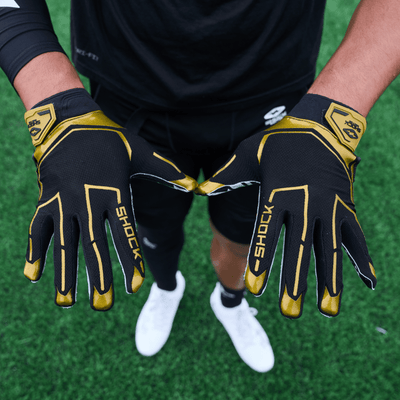 Shock Doctor Black/Gold King Showtime Football Receiver Gloves - Lifestyle Detail View of Back of Hand
