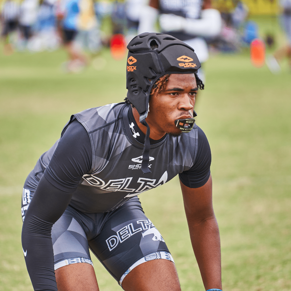 Shock Doctor Showtime Showtime Soft Shell Protective Headgear - Lifestyle Shot on Youth Football Player Wearing Headgear and Lipguard