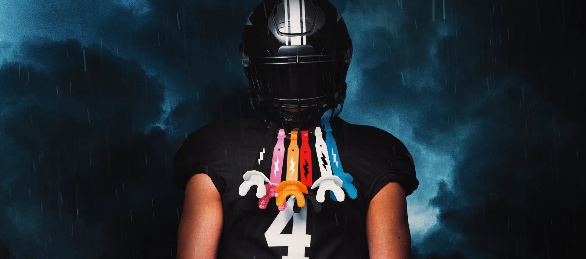 Youth Football Tackle Athlete Wearing Thunder Bolt Lip Guards  - Featured on a Dark Stormy Background