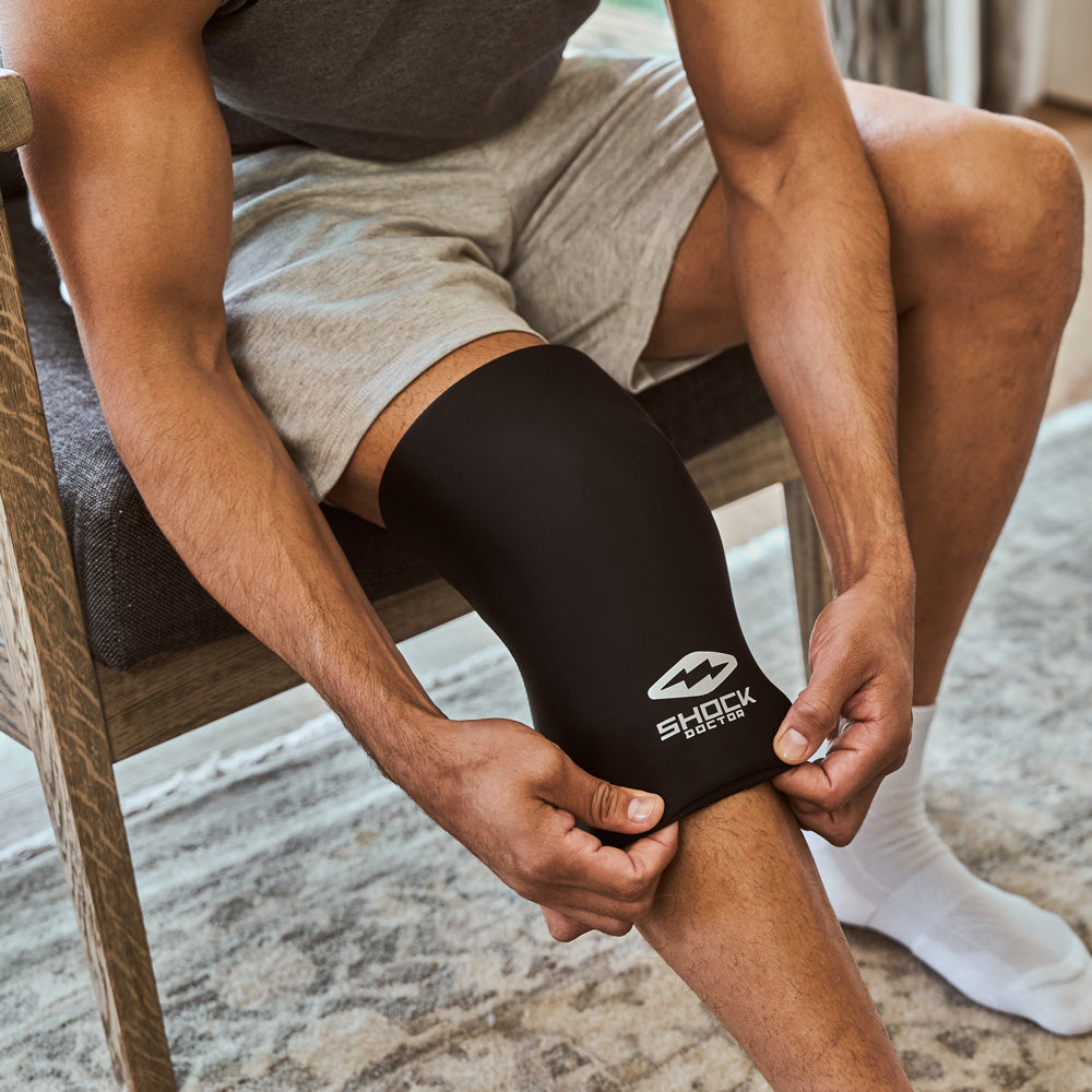 Thigh Compression Sleeve up over his knee