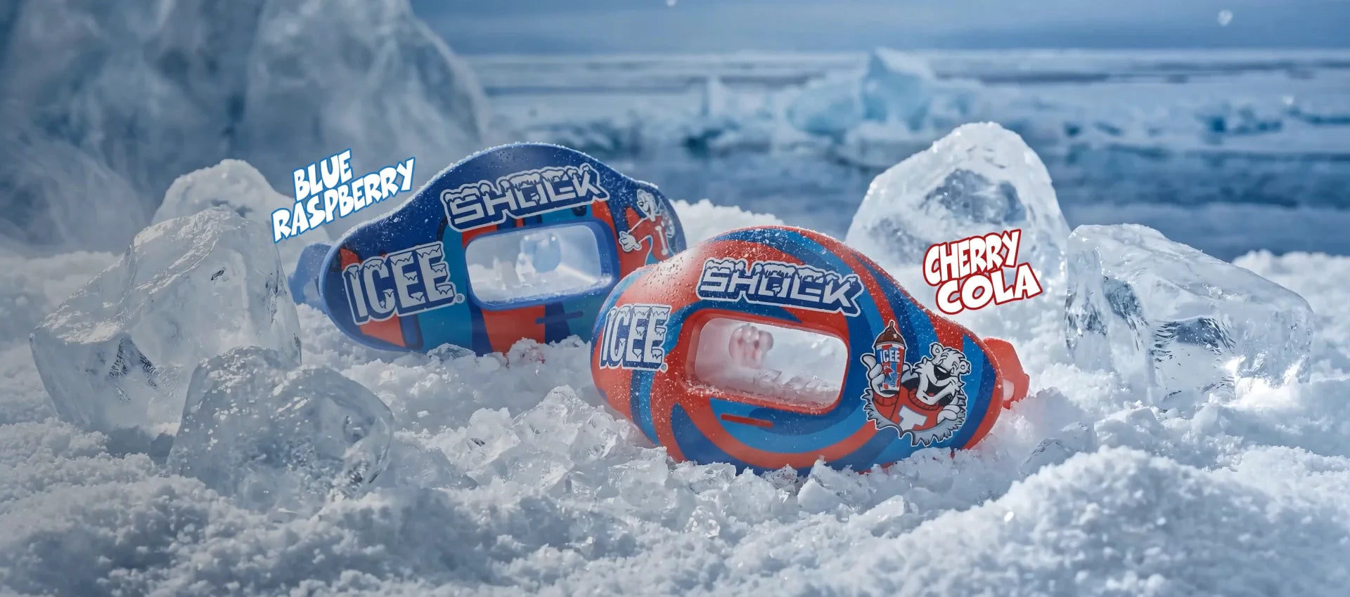 Two ICEE lip guards, one blue raspberry flavor and one cherry cola flavor, surrounded by ice cubes with a snowy background.