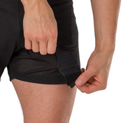 Shock Doctor Men's Loose Hockey Short with BioFlex Cup - Black - On Model - Detail View of Front Velcro® patch for ease in securing socks