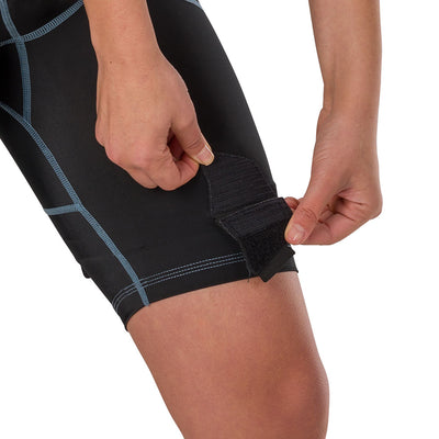 Shock Doctor Women's Compression Hockey Short with Pelvic Protector - Black - On Model - Detail View of Front Velcro® patch for ease in securing socks