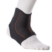 Shock Doctor Ankle Sleeve worn on foot, side view showing low-profile compression coverage