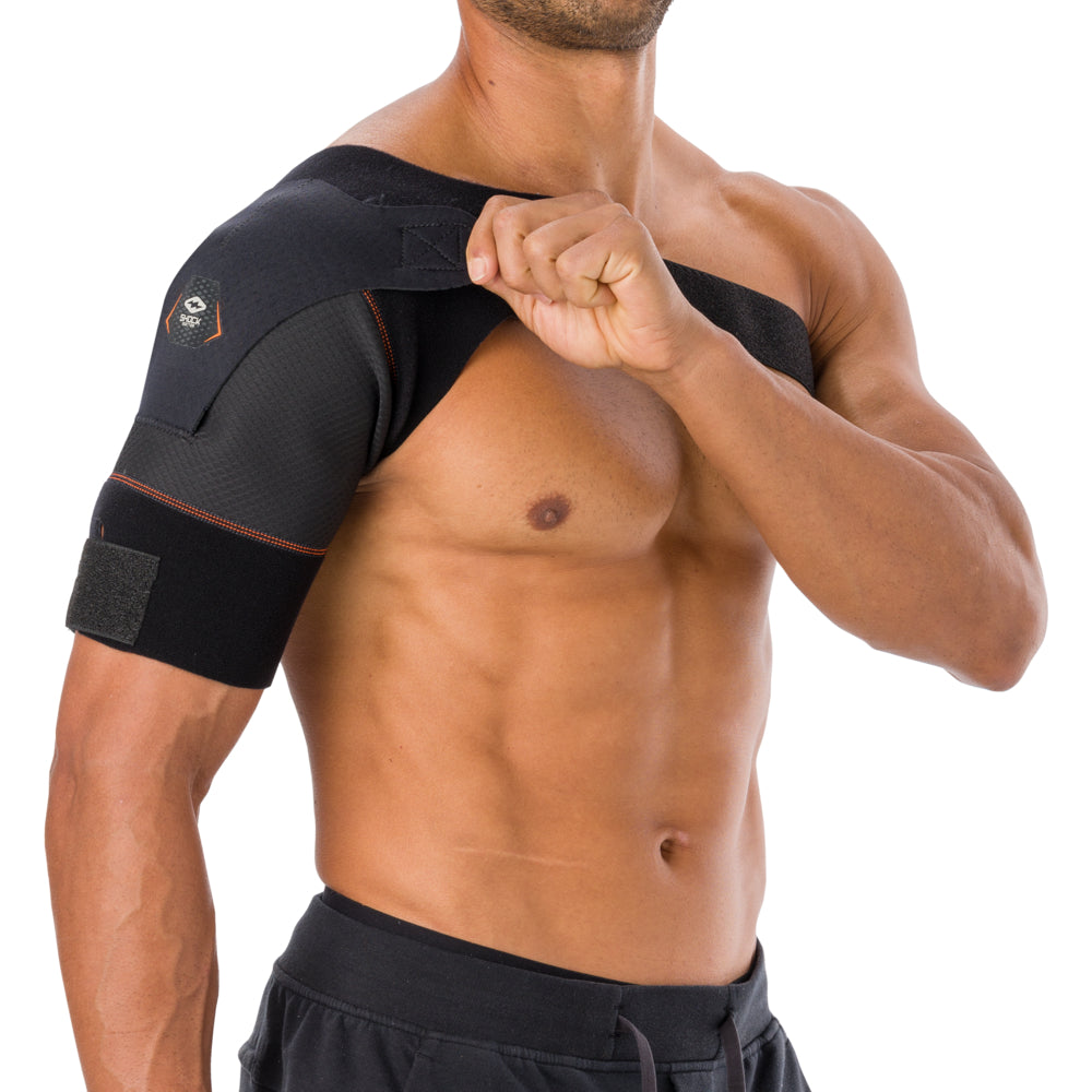 Shock Doctor Shoulder Wrap worn on the shoulder, front view with arm raised showing fit and range of motion