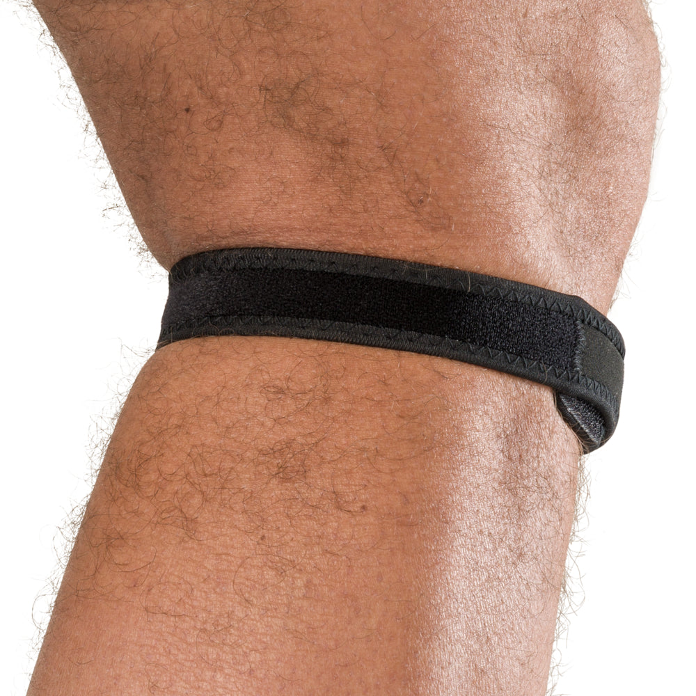 Back view of Shock Doctor Jumper Knee/Patella Support Strap showing hook-and-loop closure behind knee