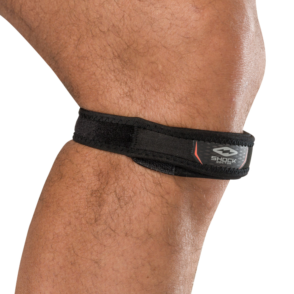 Shock Doctor Jumper Knee/Patella Support Strap worn below the kneecap, side angle view