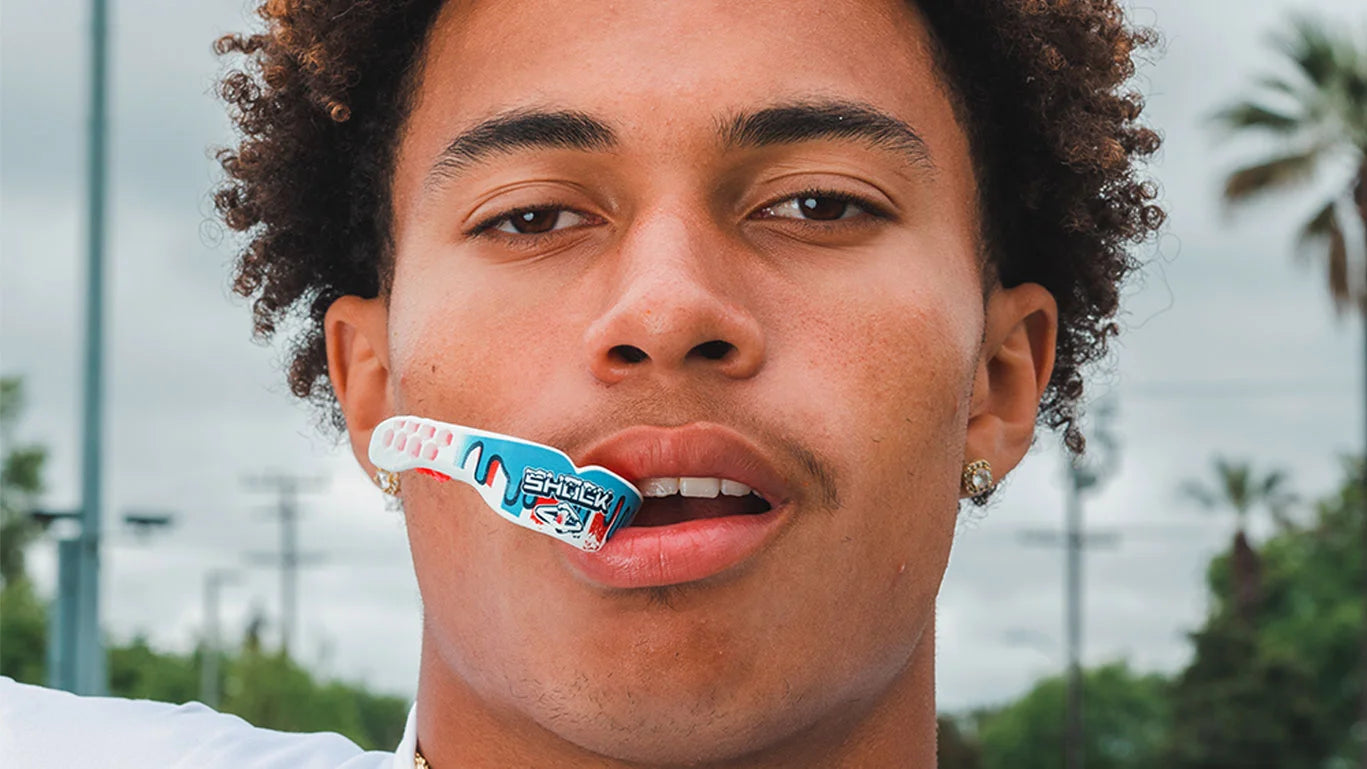 Youth Football Athlete Wearing Shock Doctor ICEE Gel Max Power Mouthguard