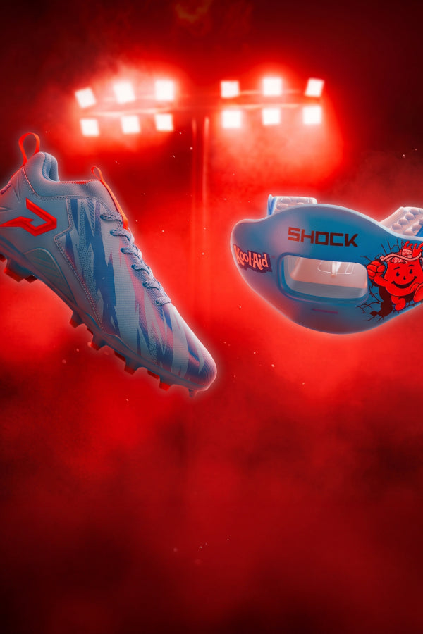 Kool-Aid Mixed Berry Football Cleat by Phenom Elite and Shock Doctor Kool-Aid Tropical Punch  Max AirFlow Lip Guard featuring the Kool-Aid Man, floating under red stadium lights