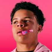 Youth Athlete Wearing Jolly Rancher Gel Max Power Flavor Fusion Mouthguard (Watermelon Flavor)