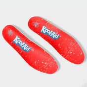 Kool-Aid Cherry cleat insoles by Phenom Elite, red with white splatter and the Kool-Aid logo