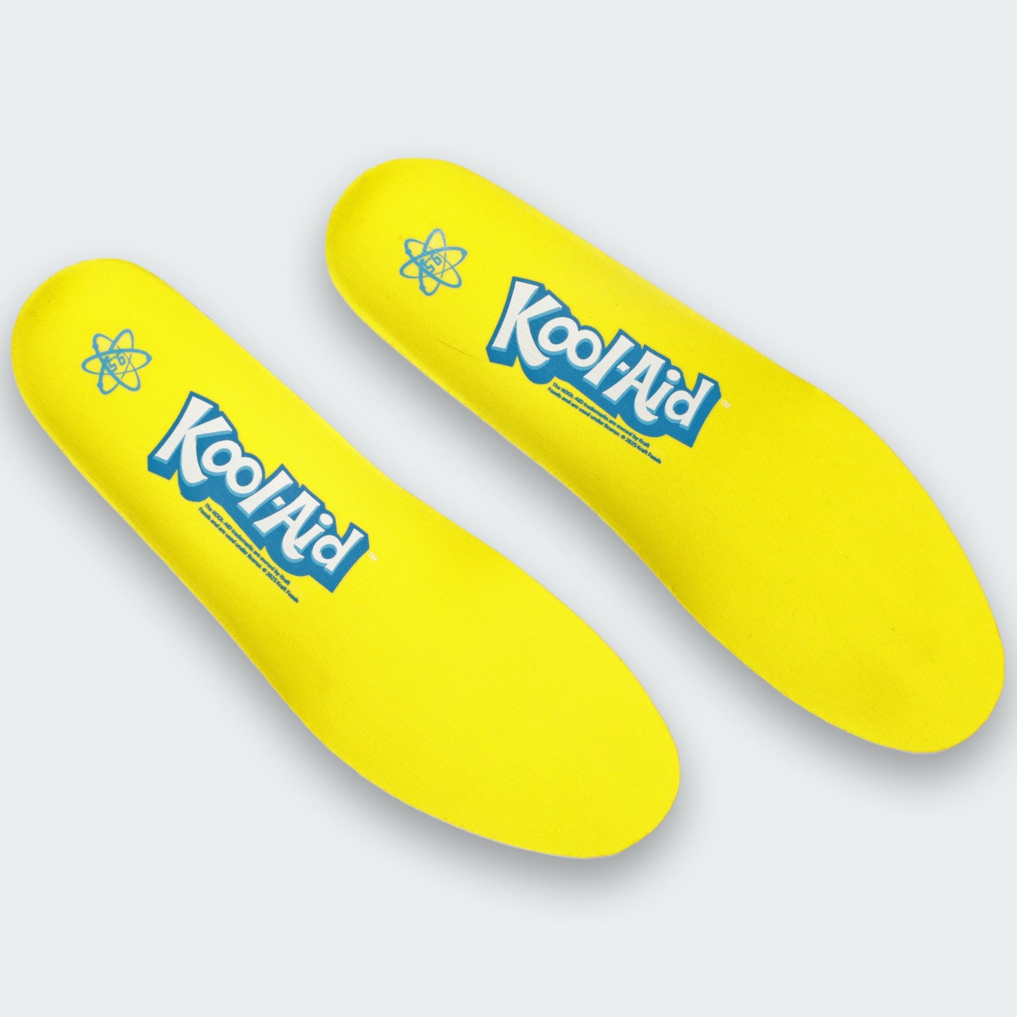 Kool-Aid Sharkleberry Fin cleat insoles by Phenom Elite, yellow with the Kool-Aid logo