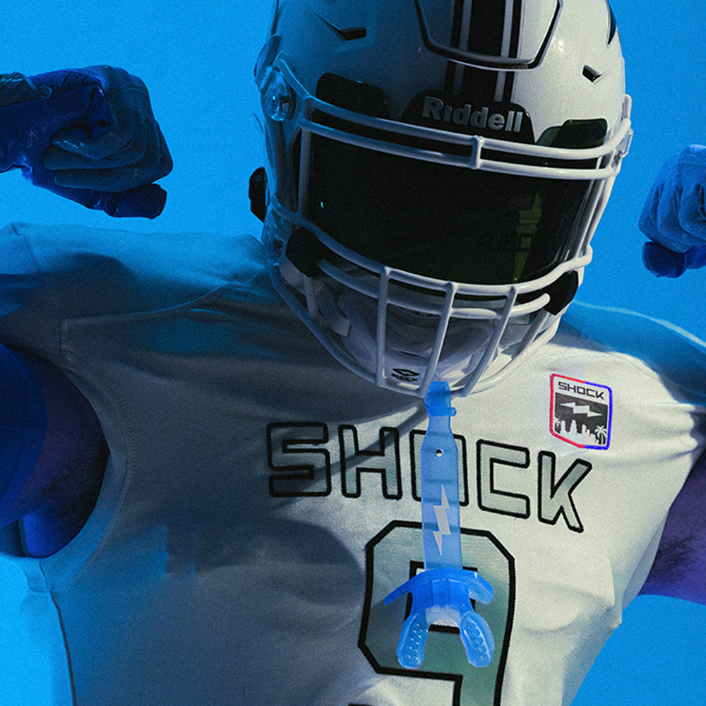 Tackle Football Player Wearing Shock Doctor Thunder Bolt Lip Guard (Translucent Blue Color)
